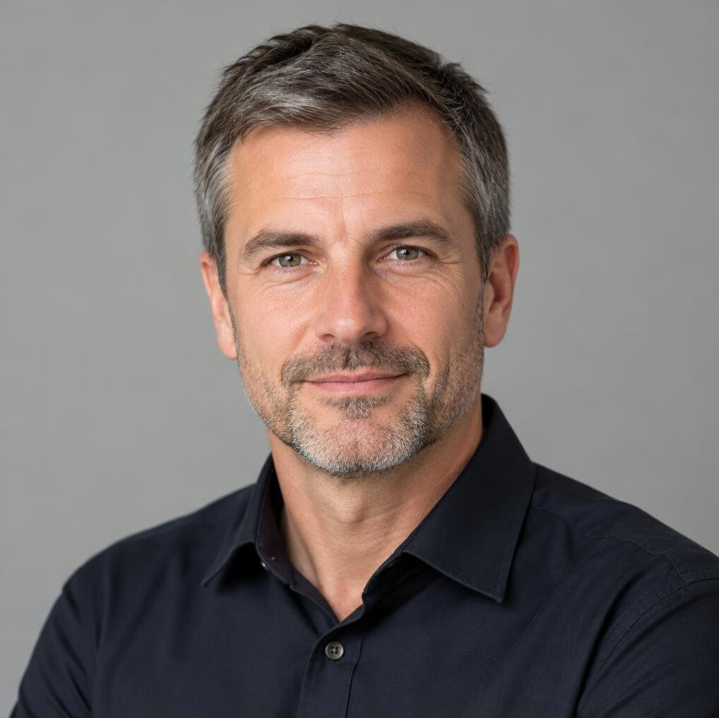 Portrait of a man in a collared shirt